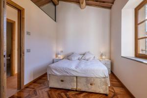 Postel nebo postele na pokoji v ubytování Casa Bachella