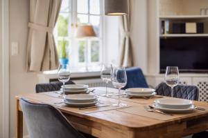 Televiisor ja/või meelelahutuskeskus majutusasutuses Gaat 7 Coquette