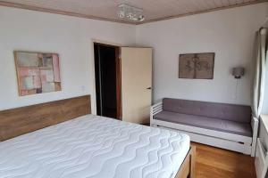 Ένα ή περισσότερα κρεβάτια σε δωμάτιο στο Koidu Apartment Kuressaare +20 φωτογραφίες