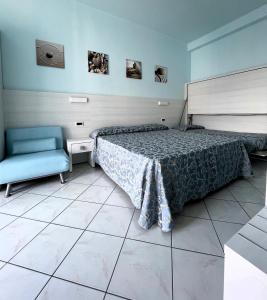 Postel nebo postele na pokoji v ubytování Hotel Mirabella