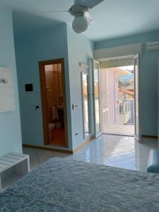 Postel nebo postele na pokoji v ubytování Hotel Mirabella