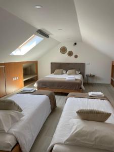 Säng eller sängar i ett rum på Porto Smart Apartments Comfort