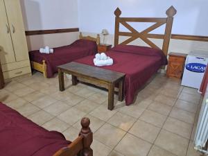 Cama ou camas em um quarto em Hostería Austral