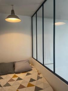 Postel nebo postele na pokoji v ubytování Architect Loft