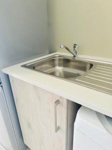 a bathroom with a sink on a counter at #Top quality BnB #Fast WiFi #Self Check-in #Secure Parking in Midrand +31 photos
