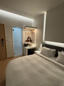Кровать или кровати в номере Mirada Hotel