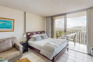 Ένα ή περισσότερα κρεβάτια σε δωμάτιο στο Honolulu Horizon Haven-30 night minimum +10 φωτογραφίες