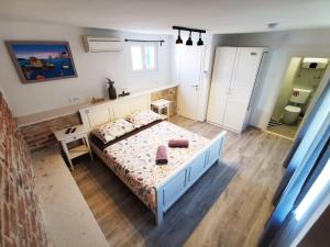 Ένα ή περισσότερα κρεβάτια σε δωμάτιο στο Croparadise Hostel