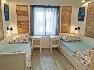 Ένα ή περισσότερα κρεβάτια σε δωμάτιο στο Croparadise Hostel