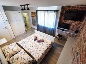 Ένα ή περισσότερα κρεβάτια σε δωμάτιο στο Croparadise Hostel