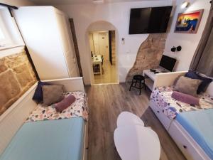 Ένα ή περισσότερα κρεβάτια σε δωμάτιο στο Croparadise Hostel