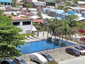 an overhead view of a swimming pool in a city at Pamz Studio Condo Unit in Lapu Lapu City