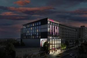 a rendering of a building with pink lights at Moxy Asheville in Asheville