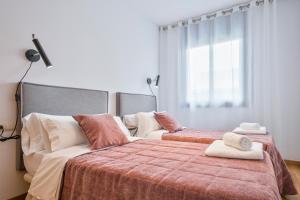 Apartment Pere IV tesisinde bir odada yatak veya yataklar