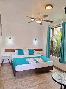 Postel nebo postele na pokoji v ubytování Toucan Platinum Suites Aparthotel + 37 fotografií