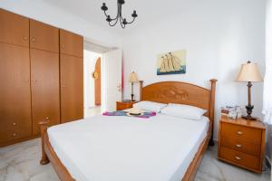 Postel nebo postele na pokoji v ubytování Villa di Μare
