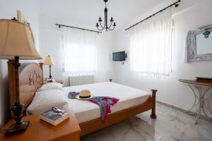 Postel nebo postele na pokoji v ubytování Villa di Μare