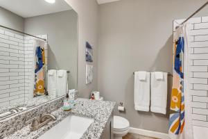 a bathroom with a sink and a toilet at Platte City Retreat with Patio, Near Kansas City! in Platte City +17 photos