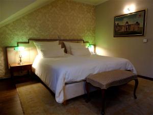 Llit o llits en una habitació de Hotel Mitra, Story Hotels
