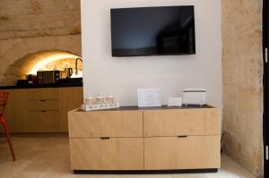 Μια τηλεόραση ή/και κέντρο ψυχαγωγίας στο Suite Santa Caterina