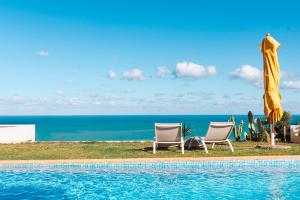 Sundlaugin á Oasis Santorina Pool Sea Sky eða í nágrenninu