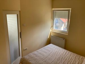 Rúm í herbergi á Apartment AN
