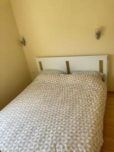 Postel nebo postele na pokoji v ubytování Apartment AN