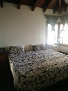 Posteľ alebo postele v izbe v ubytovaní Acogedora casa con vista al lago complejo turístico