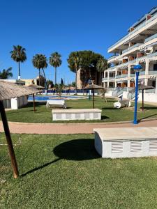 a park with a playground and a large building at Apartament Sony in Denia