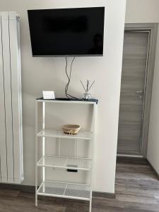 TV a/nebo společenská místnost v ubytování Nizza 90