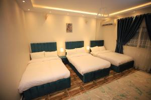 Katil atau katil-katil dalam bilik di Happy Day Pyramids View Hotel