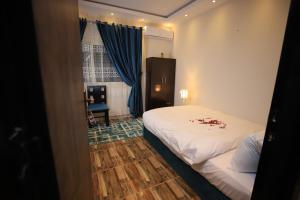Katil atau katil-katil dalam bilik di Happy Day Pyramids View Hotel