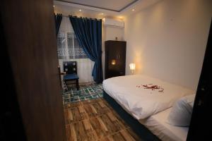 Katil atau katil-katil dalam bilik di Happy Day Pyramids View Hotel