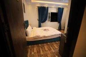 Katil atau katil-katil dalam bilik di Happy Day Pyramids View Hotel