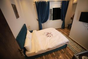 Katil atau katil-katil dalam bilik di Happy Day Pyramids View Hotel