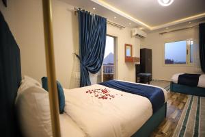 Katil atau katil-katil dalam bilik di Happy Day Pyramids View Hotel