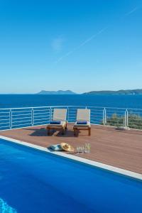 The swimming pool at or close to Iris Villas Lefkada - Karavi Villa with private sea access