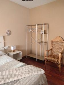 Postel nebo postele na pokoji v ubytování HR Liberdade