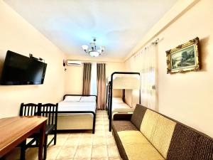 Μια τηλεόραση ή/και κέντρο ψυχαγωγίας στο Hotel Asteri