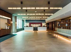 a lobby of a hospital with a waiting room at Radisson Blu Waterfront Hotel, Stockholm in Stockholm