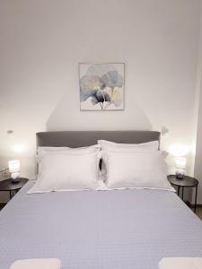 Ένα ή περισσότερα κρεβάτια σε δωμάτιο στο Blue Horizon, the apartment