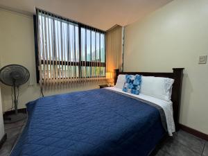 Ένα ή περισσότερα κρεβάτια σε δωμάτιο στο The Rainier Bed & Breakfast 5