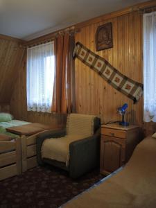 Ein Bett oder Betten in einem Zimmer der Unterkunft Pokoje u Tosi i Czesia