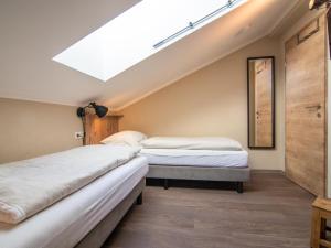 Łóżko lub łóżka w pokoju w obiekcie Chalet Sonnenalp