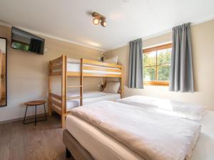 Łóżko lub łóżka w pokoju w obiekcie Chalet Sonnenalp