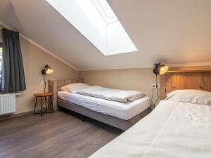 Łóżko lub łóżka w pokoju w obiekcie Chalet Sonnenalp