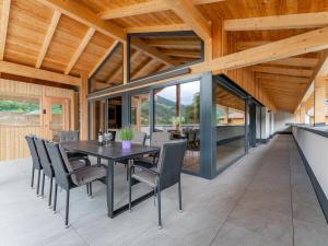 a dining room with a table and chairs at Luxury Sankt Lorenzen in Sankt Lorenzen ob Murau