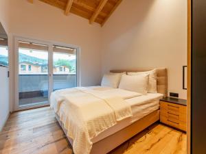 Katil atau katil-katil dalam bilik di Luxury Sankt Lorenzen