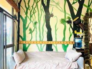 Katil atau katil-katil dalam bilik di Yangshuo Mountaintop Resort阳朔半山居民宿