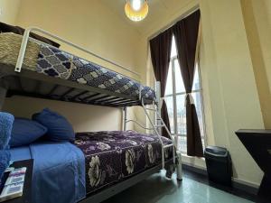 Postel nebo postele na pokoji v ubytování Rooms Zocalo + 37 fotografií